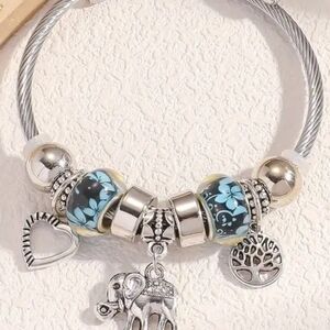 Charm Bracelet with Blue Floral Glass Beads and Elephant Charm